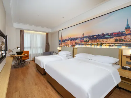 Vienna International Hotel (Tianjin Guozhan Wuyue Plaza) Отели рядом с достопримечательностью «Tianjin Occupation Skill Public Training Center Gymnasium»