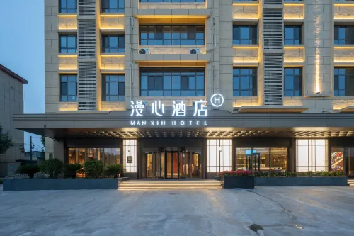 Manxin Hotel Cangzhou Huanghua Municipal Government - parking