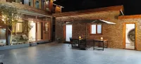 Zhuyin Qingfeng Guesthouse 화궈산/화과산 관광단지 호텔