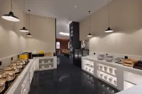 Huanzhi Hotel (Jingdezhen China Ceramic Museum Baolong Mall Branch) - servizio colazione