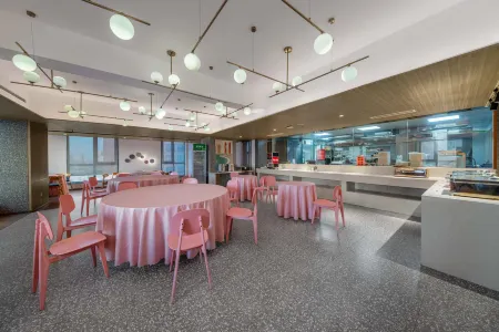 Fulaiya Hotel (Zhengzhou Zhongyuan Futa Hanghai Stadium) Отели рядом с достопримечательностью «Henan Traffic Technician Institute»