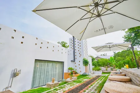 Joy Villa Отели рядом с достопримечательностью «Jiuzhen Forest Park»