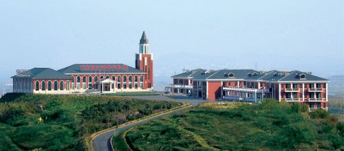 Longkou Nanshan Zhonggao Association International Training Center Отели в г. Лункоу