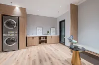 Yilong Wanguo Hotel (Jinan Railway Station North Square K88 Famous Spring Square)