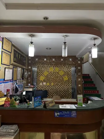 Huanghui Business Hotel (Renhe Road) Отели рядом с достопримечательностью «Shuzhen Gymnasium»