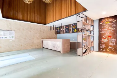 Youyue Light Luxury Intelligent Jumu Cinema Apartment (Changchun Chaofan Street Branch) Отели рядом с достопримечательностью «Changchun Institute of Architecture (High-tech Campus)»