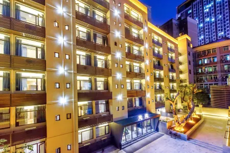 Huiyuan Hotel (Chongqing Shapingba High Speed Railway Station Jinsha Tianjie Branch) Отели рядом с достопримечательностью «Sichuan Waiguoyu University»