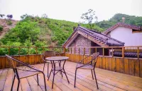 Hongya Valley Inn فنادق في بينغ شان
