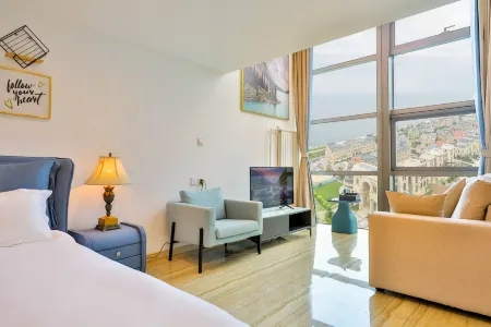 Ocean View loft Hotel Donggang International Mansion (Venice Watertown Branch, Dalian)