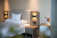 Muzi Hotel (Leshan High-Speed Railway Station Jiaxing Road Food Street) - 2-نجوم