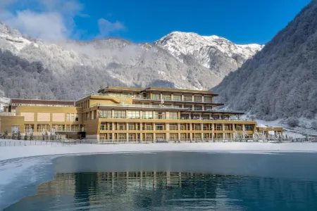 Qafqaz Tufandag Mountain Resort Hotel Отели в г. Габала