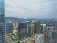 Dushi Yijia Apartment (Guangxi Sports Center)