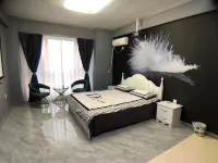 Harbin Woju Apartment Отели рядом с достопримечательностью «Центр выставки в Харбине-Спортивный стадион»