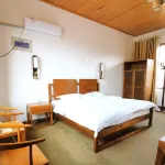 Feixian Yuhua Jingxuan Homestay - balcón
