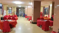 Jingqiao Business Hotel (Wuchuan International Airport)