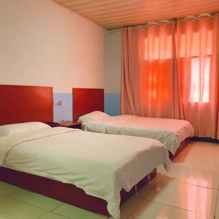 Queshan Xiaotiandi Hotel