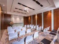 เซอร์วิสอพาร์ตเมนต์ Suisse Place ศูนย์การประชุมและนิทรรศการทะเลสาบจินจิ ซูโจว โรงแรมใกล้มูนฮาร์เบอร์
