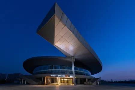 Jinyi Optimal Selection Hotel (Baotou Olympic Park Branch) Отели рядом с достопримечательностью «Yinhe Square»