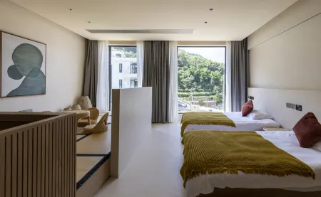 Ryan sunrise Valley B & B Отели рядом с достопримечательностью «Huayan National Forest Park»