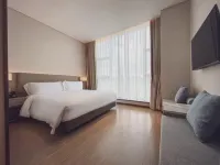 Fenggang Fengjing Hotel – Yongsheng Avenue Hotell i 