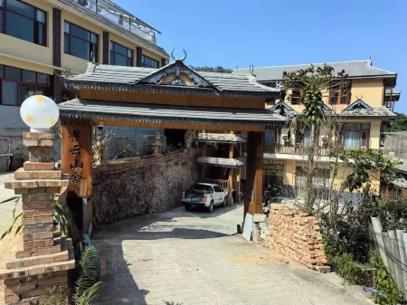 Xiang Tu Gu Shi Jing Yun Shan She Отели рядом с достопримечательностью «The Old Bulang Ethnicity Village of Wenji»