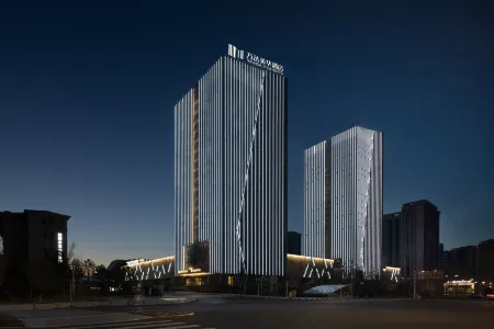 Wanda Moments, Urumqi Railway Station Отели рядом с достопримечательностью «Xinjiang Institute of Engineering»