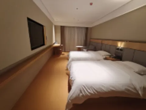 โรงแรมแมนคาลีเฉิงซวน (สวนป๋อไห่ สถานีรถไฟความเร็วสูง ต้าหลี่)