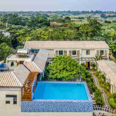 潿洲島芙羅拉私家花園度假民宿（貝殼沙灘店） Hotel Exterior