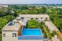 Weizhou Island Flora Private Garden Resort B&B (Shell Beach) فنادق في بَيخاي