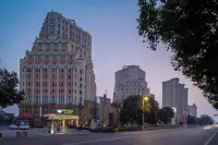 Manju Hotel (Suzhou Xinghuwan) Отели рядом с достопримечательностью «Парк водно-болотных угодий класса Цзянсу»