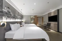 Qing Teng Yi Su Hotel (Ningbo Beilun Ning Vocational College Store) Hotel di Area Pelabuhan Beilun