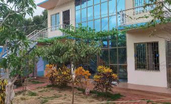 Xuwen Jiaoweixiang Nanyuan Homestay