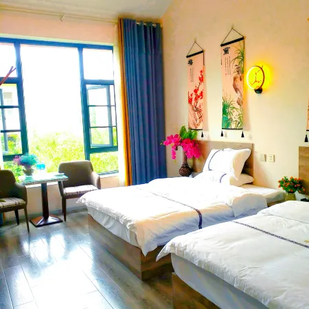 Shilin Youyou Inn Отели рядом с достопримечательностью «Stone Forest Ice & Snow Ocean World»