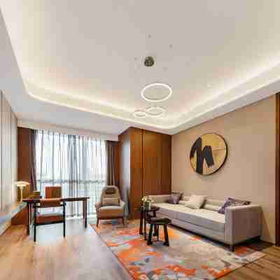 Grand New Century Hotel Suzhou Si County Rooms