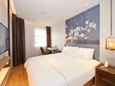 Magnotel Отели рядом с достопримечательностью «Shanghai University of Engineering Science (Xincun Road)»