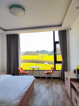 Luoping Chunri Xiaoyuan Homestay (Jinji Peak Cong Branch) Отели в г. Луопинсянь