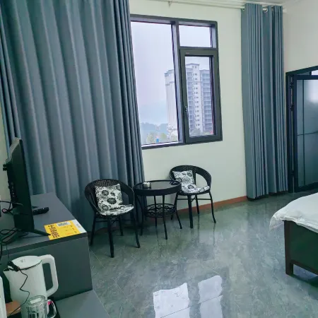 Guibao Apartment (Chongqing Tourism College) Отели рядом с достопримечательностью «Холл-Стрит Планирование Выставок»