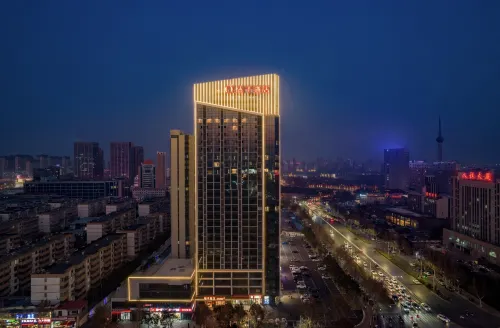 Orange Hotel (Jiaozuo Municipal Government Wanda Plaza) - فطور
