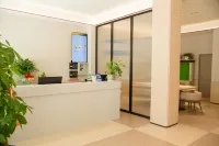 Jinju Hotel (Liansheng Happy City Railway Station) Hotel di De'an