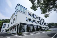 Qianhuju EZ Hotel (Dongqian Lake Guojihuiyizhongxin) Hotel in zona Dongqian Lake Small Putuo