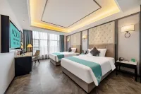 Xana Hotelle (Wuzhou Teng County Weilin City Plaza) فنادق في مديرية تنغ