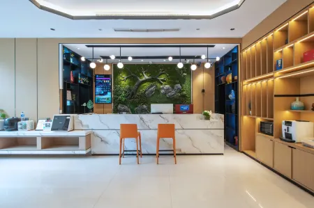 Yiwang Hotel (Shuangyu Passenger Transport Center Wenjin Road) Отели рядом с достопримечательностью «Zhejiang Anfang Vocational and Technical College»