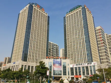 Yuefeishang Smart Homestay (International Convention and Exhibition Center) Отели в г. Луохэ