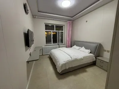 Mudanjiang Yixin Guest House Hotell i Aimin District
