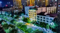 Qiaojia White Crane Inn Отели рядом с достопримечательностью «Чжэнцзян Бай Пич сельский пассажирский автобус»