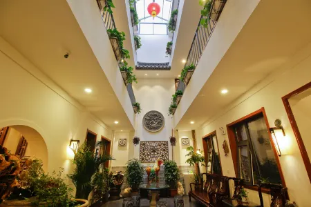 Xi'an Shuyuanli Homestay (Bell and Drum Tower Yongningmen Subway Station) Отели рядом с достопримечательностью «Liu Garden»