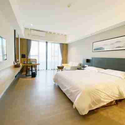 Xinxing Xiangshun Xiangwo Hotel Rooms