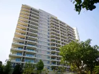 Yimi Yangguang Seaview Holiday Apartment Отели рядом с достопримечательностью «Королевство морских медуз Южного моря»
