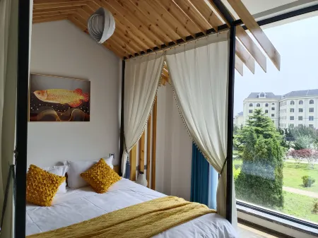 JIUJIU INN Отели рядом с достопримечательностью «Dalian University of Foreign Languages (Lvshun South Road)»