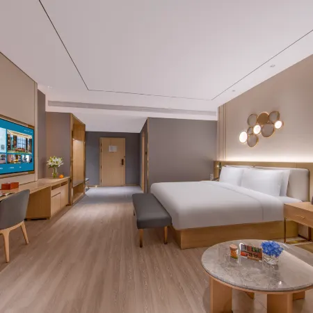 Orange Hotel (Zhengzhou East Railway Station Jinshui Road Branch) Отели рядом с достопримечательностью «Школа Чуньхуа, Новый район, Цуэндун»
